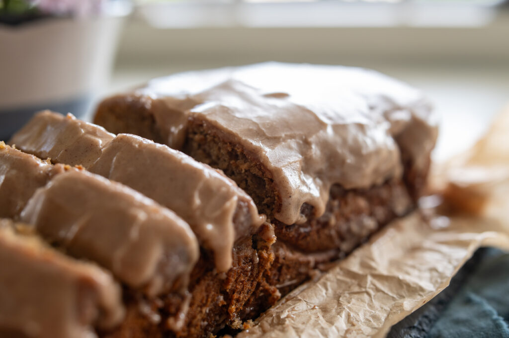 close up of a sliced pumpkin spice banana bread